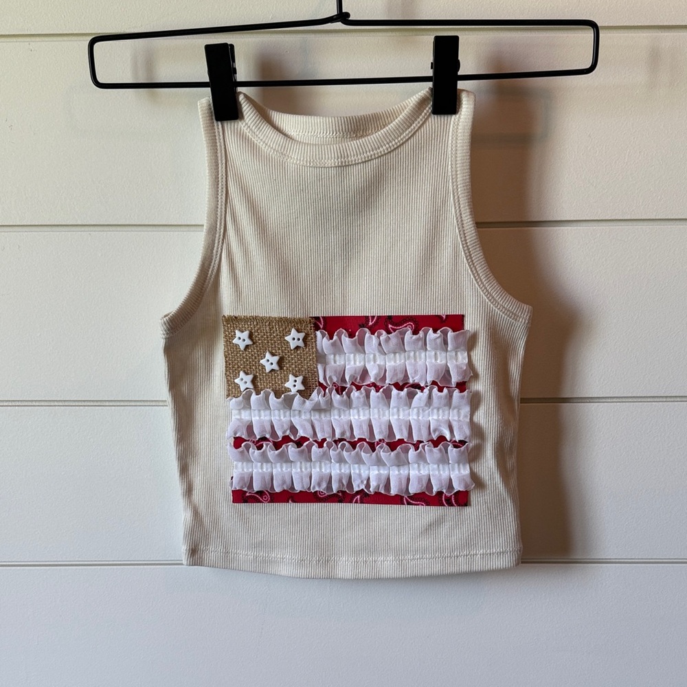 Art Class Cream Tank Top with Red, White, and Brown Flag Design